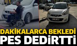 Engelli, park edilen otomobil yüzünden kaldırıma çıkamadı