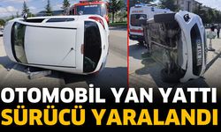 Otomobil yan yattı