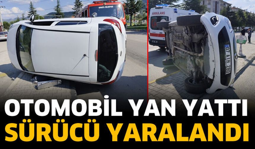 Otomobil yan yattı